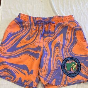 B0808 VTG MTv Large trunks & Music MTv logo on orange and lavender background